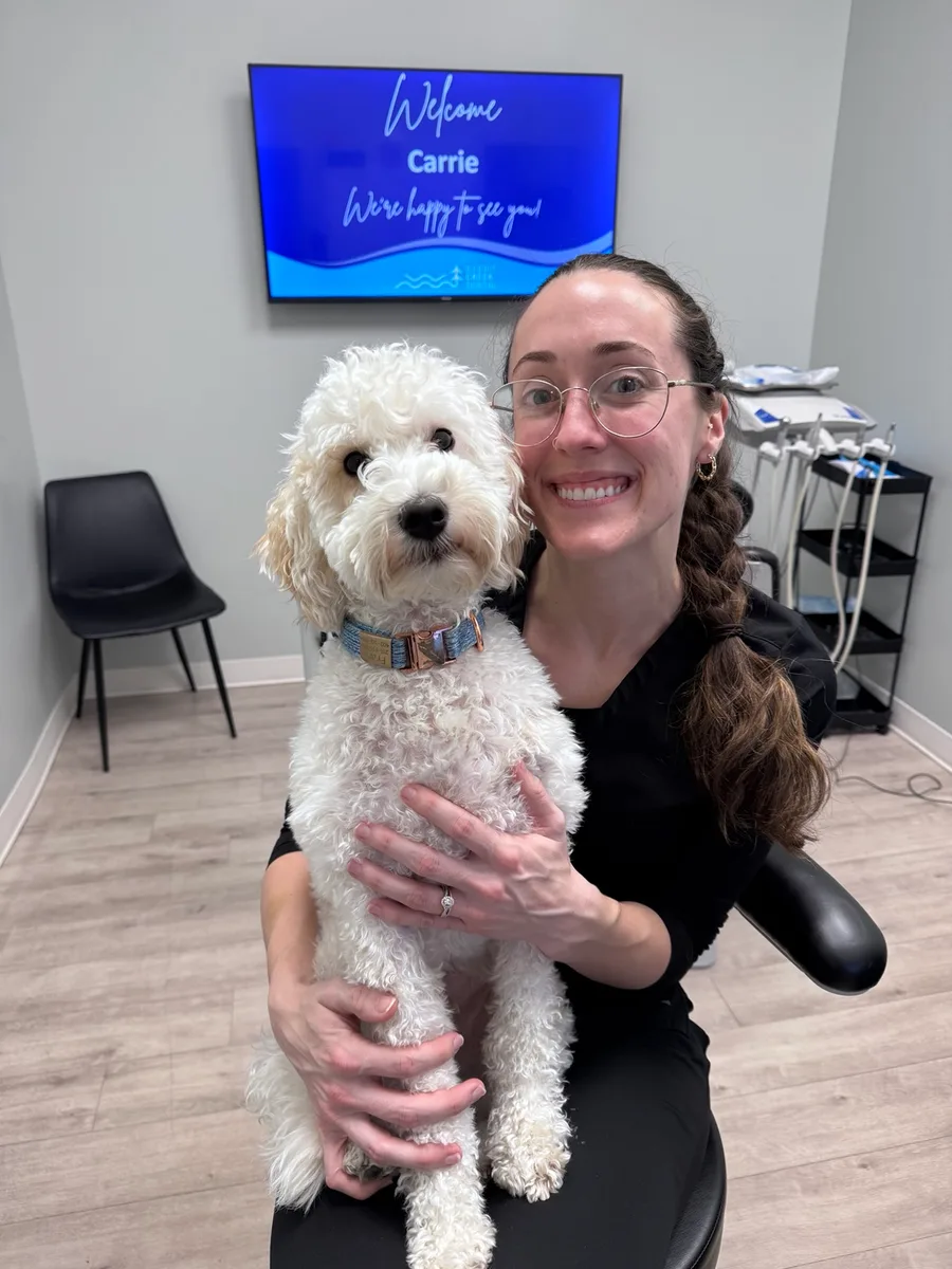 Shannon with Frank the dog at Rabbit Creek Dental